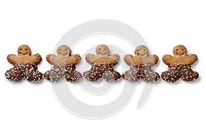 Happy chocolate gingermen cookies in a rows on white background
