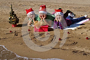 Happy christmas children on beach