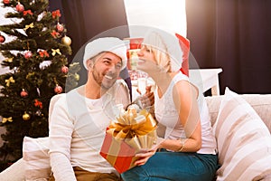 Happy Christmas couple celebrating New Year