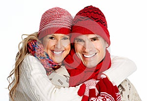 Happy christmas couple in winter clothing.