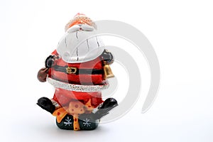 Happy Christmas Santa Claus doll with christmas decorations box isolated on white background with copy space.