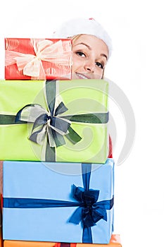 Happy Christmas woman behind presents