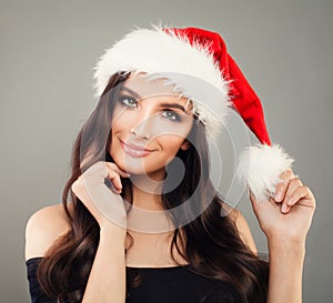Happy Christmas Woman Fashion Model in Red Santa Claus Hat