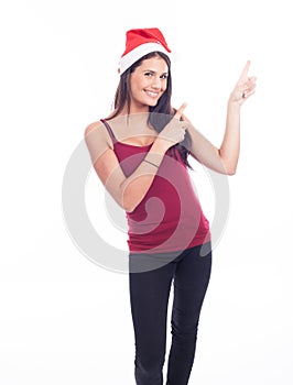 Happy christmas woman pointing