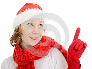 Happy Christmas woman points a finger upward