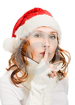 Happy Christmas woman points to the silence