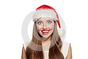 Happy Christmas woman in Santa hat isolated on white