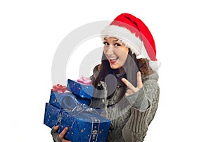 Happy Christmas woman showing victory sign