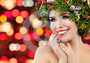 Happy Christmas woman smiling on bright bokeh sparkle background