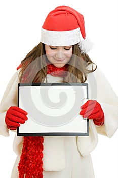Happy Christmas woman with tablet in hand