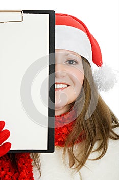 Happy Christmas woman with tablet in hand