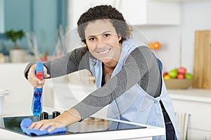 Happy cleaner at home photo