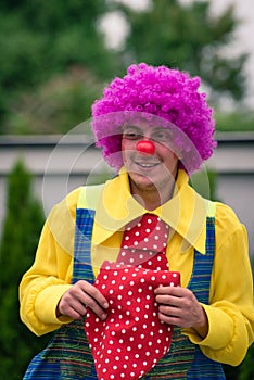 Happy clown with big red tie