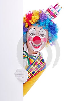 Happy clown with the blank board