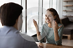 Happy confident candidate telling about experience at job interview