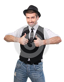 Happy confident man with thumbs up gesture