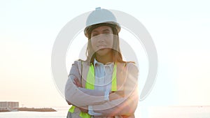 Happy, construction professional female worker on site. Closeup of happy, confident, independent contractor beginning a