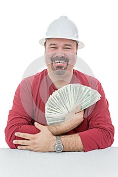 Happy construction worker holding dollar bills photo