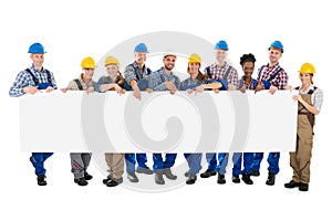 Happy Construction Workers Holding Blank Billboard