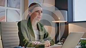 Happy consultant resting office closeup. Woman relaxing break looking distance