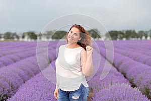 Happy and contented woman in lavender field