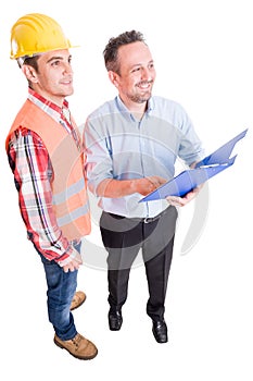 Happy contractor and construction worker