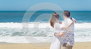 Happy couple on the beach