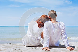 Happy couple on the beach, summer holidays or romantic  honeymoon