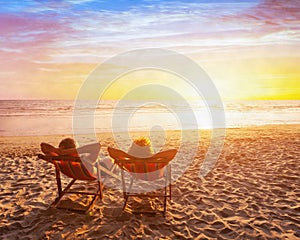 happy couple on the beach vacation, holidays getaway travel, silhouettes of man and woman