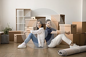 Happy couple beginning living together in new flat