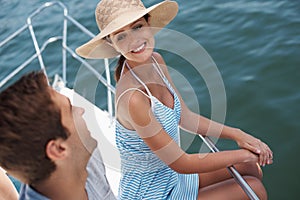 Happy couple, boat and cruise for honeymoon, smile and vacation for international travel. Ocean, yacht and luxury on the