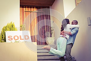 Happy couple after buying new house