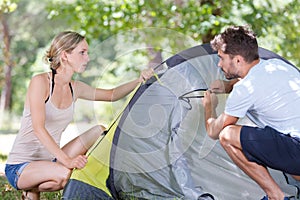 Happy couple camping