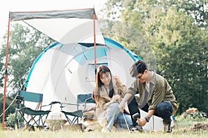 Happy couple camping life at park