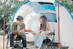 Happy couple camping life at park