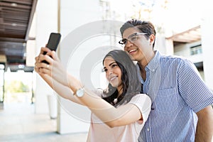 Happy Couple Capturing Perfect Moment On Date