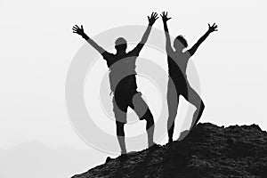 Happy couple celebrate reaching life goal and success
