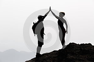 Happy couple celebrate reaching life goal and success concept