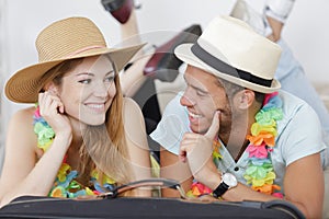 Happy couple celebrating christmas holiday in bed