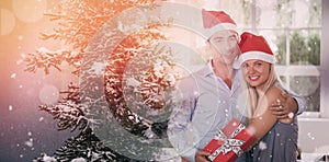 Composite image of happy couple at christmas