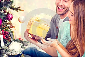 Happy Couple with Christmas Gift