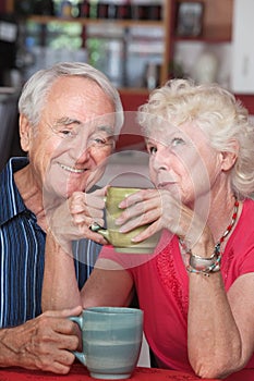 Happy Couple in Coffeehouse photo