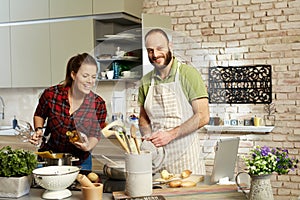 Happy couple cooking together