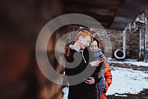 Happy couple with cute kitten