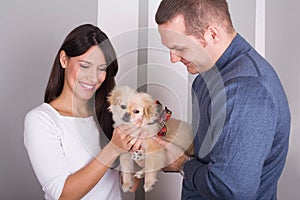 Happy couple and a dog