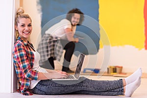 Happy couple doing home renovations