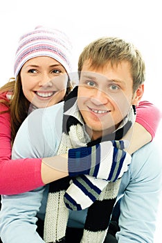 Happy couple dressed in winter clothes