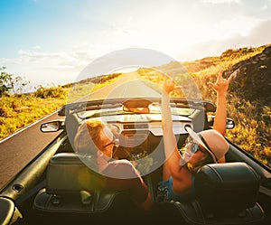 Happy Couple Driving in Convertible