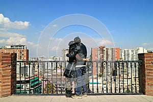 Happy Couple Embracing at the View Point of Santa Lucia Hill, Santiago, Chile, South America