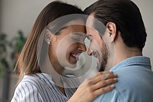Happy couple enjoy tender romantic moment together